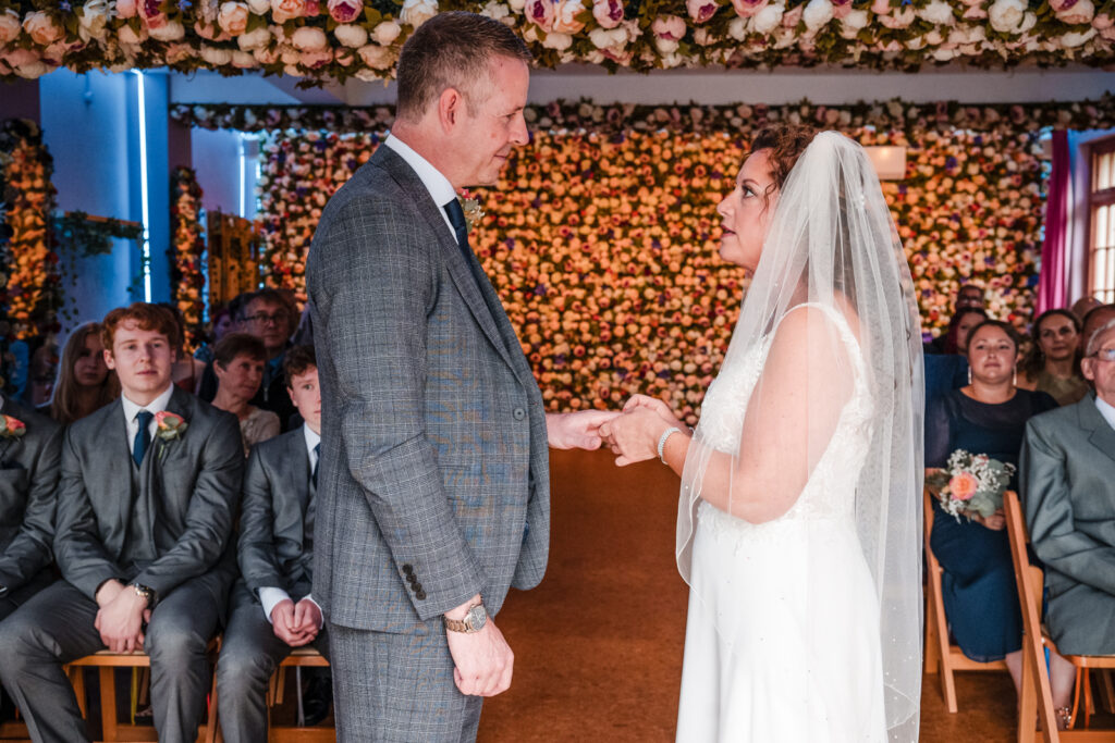 Placing Ring on Grooms Finger